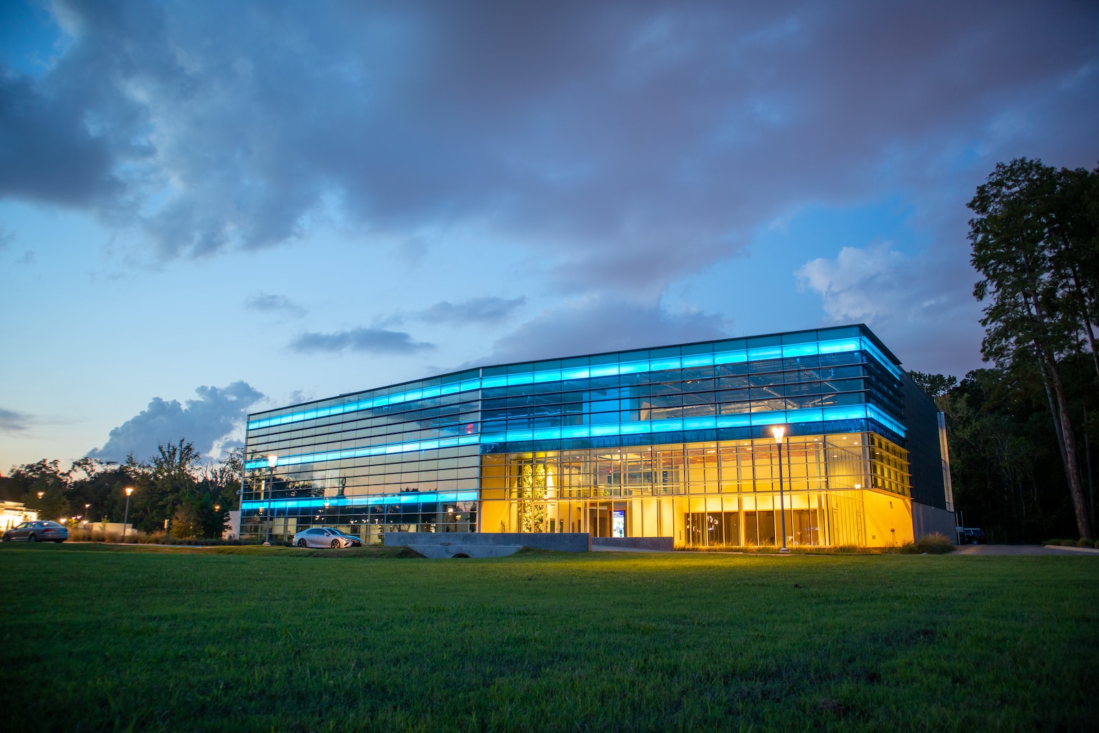 white and blue building under cloudy sky during daytime